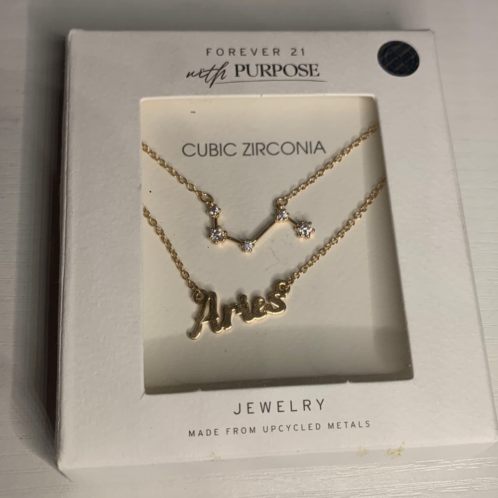 Women’s Forever 21 gold zodiac Aries necklace